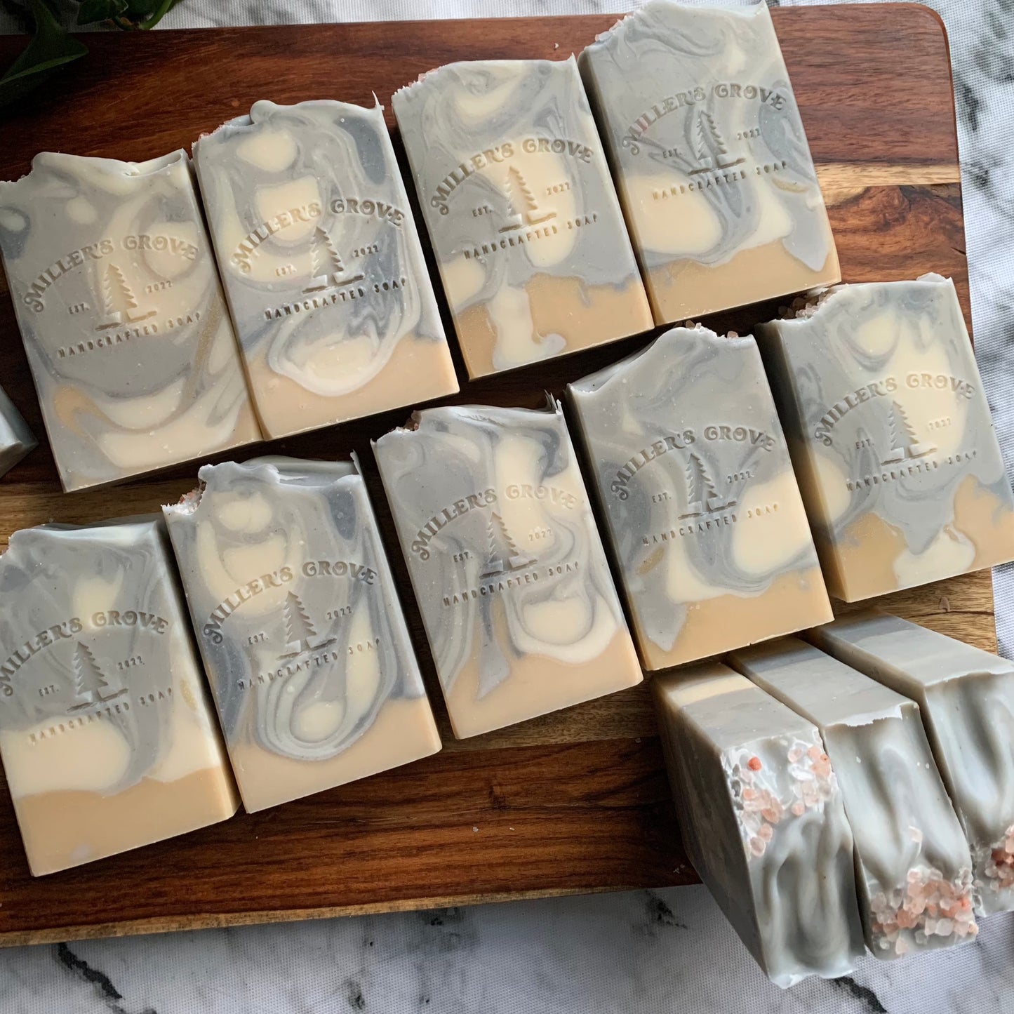 Soap bars with blue, white and beige swirls.