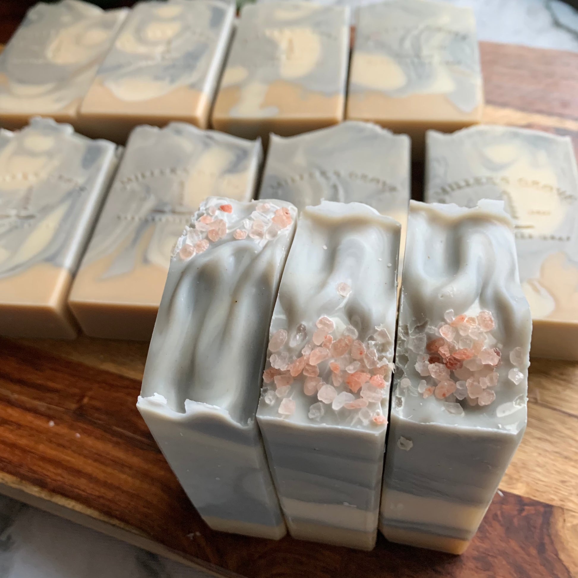 swirly soap bars with pink salt on top