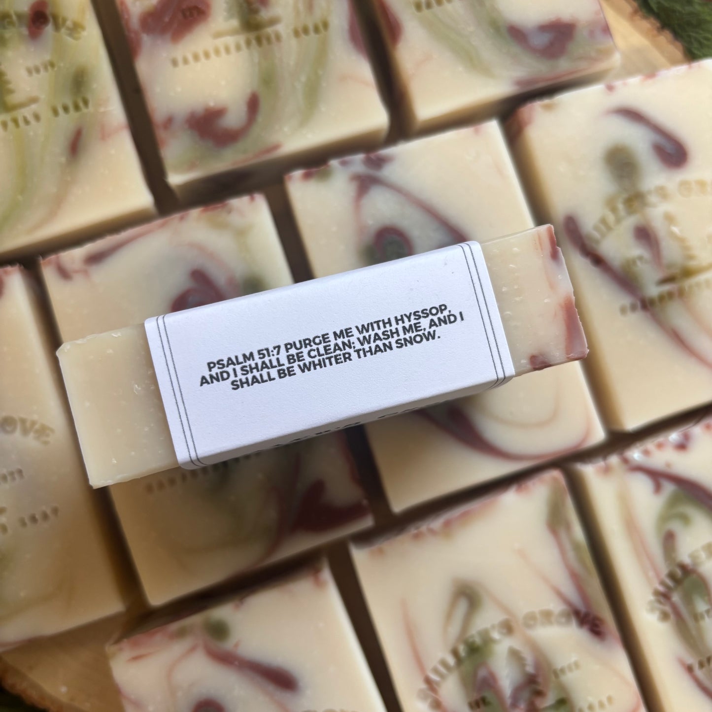 Bar of soap surrounded by more soap bars.