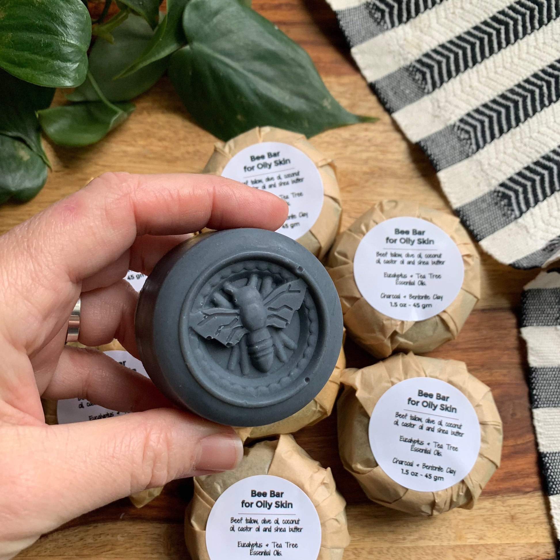 Round black facial bee bar for oily skin