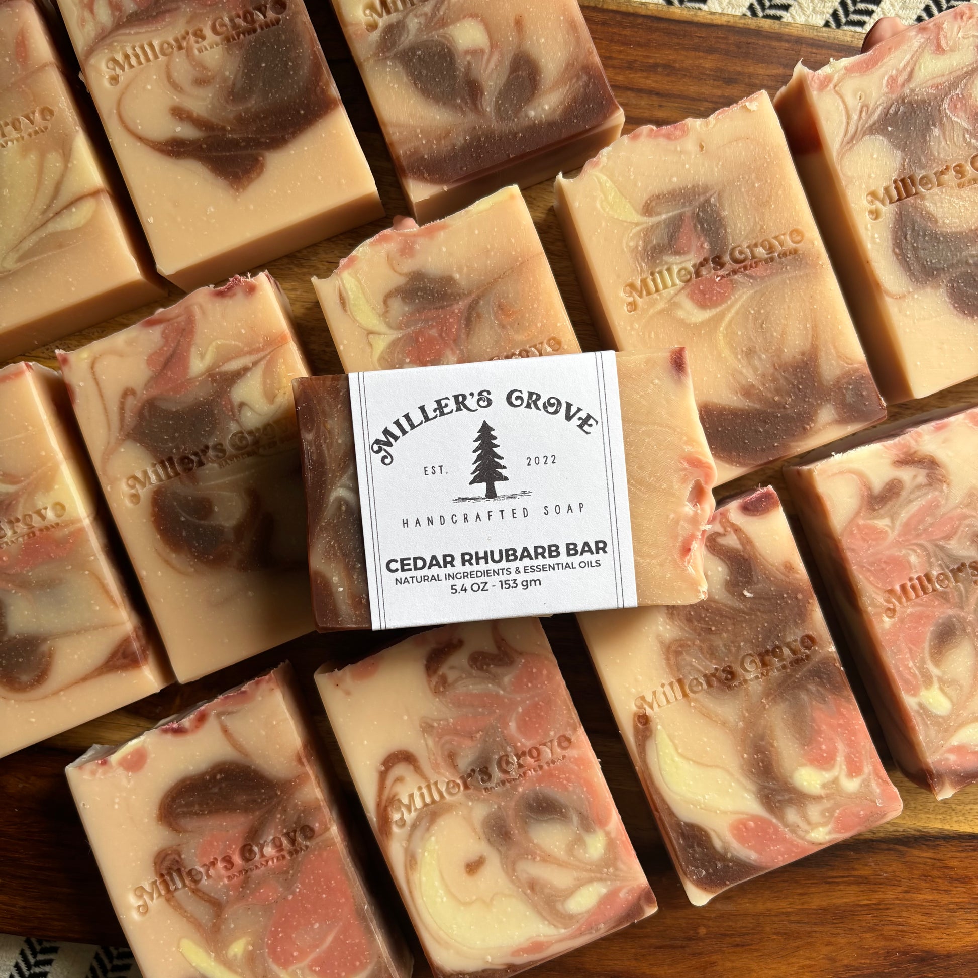 Collection of 'Miller's Grove' soap bars on a wooden surface