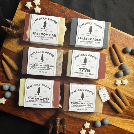 Collection of 'Miller's Grove' soap bars on a wooden board 